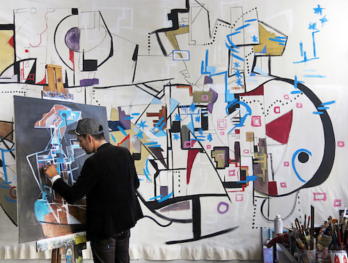 Artist Jak Ruiz working in his studio.See his portfolio by visiting www.ArtsyShark.com