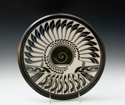 “Eclipse” Porcelain, 15”w x 4”d by artist Linda Chapman. See her portfolio by visiting www.ArtsyShark.com