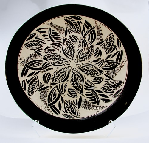 “Spinner” Porcelain, 20”w x 3”d by artist Linda Chapman. See her portfolio by visiting www.ArtsyShark.com 