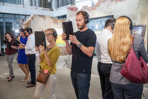 Visitors at the Danger Tree exhibit. Read about this augmented reality art show at www.ArtsyShark.com