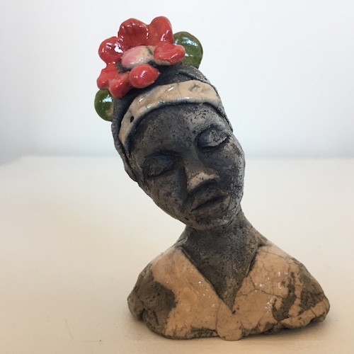 "Balinese Woman" Ceramic, 2" x 3" by artist Darcy J. Sears. See her portfolio by visiting www.ArtsyShark.com