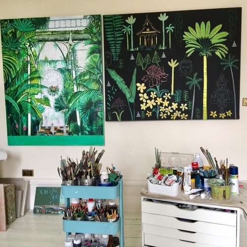 Artist Clare Haxby's studio with "The Palm House" and "The Frangipanis Led Me to The Temple" paintings by artist Clare Haxby. See her portfolio by visiting www.ArtsyShark.com