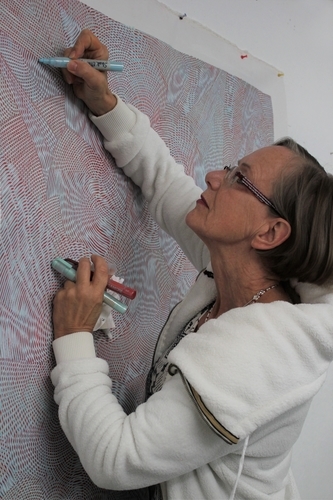 Artist Annette Mewes-Thoms in her studio. See her portfolio by visiting www.ArtsyShark.com