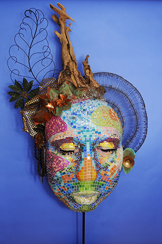 “African Mask” Mixed Media and Mosaic, 7’ x 42” x 11” by artist Gail Glikmann. See her portfolio by visiting www.ArtsyShark.com