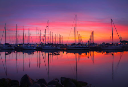 "Bayfield, Wisconsin - Sunrise on the Bay" Photography, Various Sizes by artist Wayne Moran. See his portfolio by visiting www.ArtsyShark.com