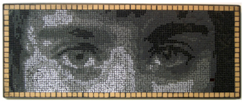 “Yezidi Boy’s Eyes” Ceramic and Glass on Wood Framed Cement Board, 50” x 18” by artist Frederic Lecut. See his portfolio by visiting www.ArtsyShark.com