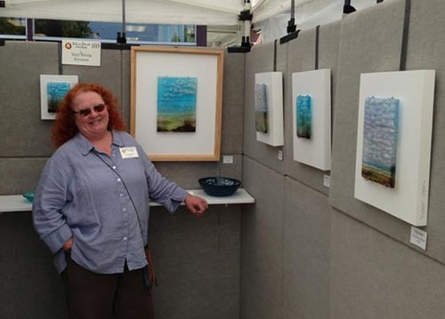 Artist Steph Mader in her show booth. See her portfolio by visiting www.ArtsyShark.com