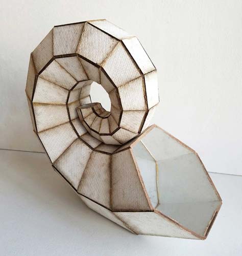 "Folded Om Shell" Masonite and Paint, 12" x 10" x 6" by artist Paulapart Pino. See his portfolio by visiting www.ArtsyShark.com
