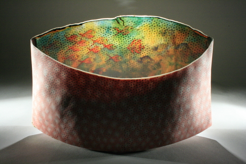 “Mundo Dorado” Porcelain, 12” x 7” x 3.5” by artist Curtis Benzle. See his portfolio by visiting www.ArtsyShark.com