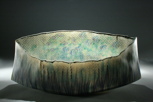 “Lavender Seas” Porcelain, 16” x 7” x 5” by artist Curtis Benzle. See his portfolio by visiting www.ArtsyShark.com