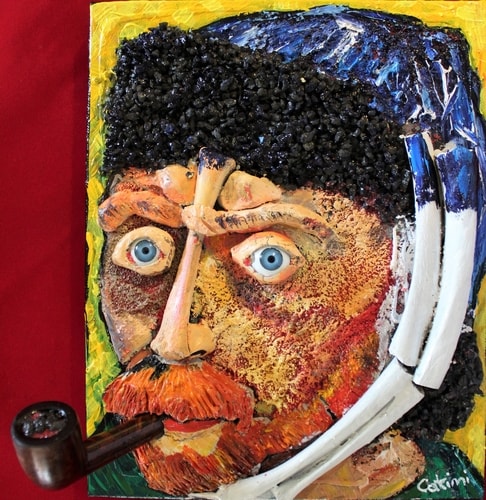 "Vincent" (Sculpainting Series) Pipe, Stones, Bones, Plastic Eyes, Clay, Glue, Acrylics and Oils on Canvas, 9" x 11" by artist Pierpaolo Catini. See his portfolio by visiting www.ArtsyShark.com