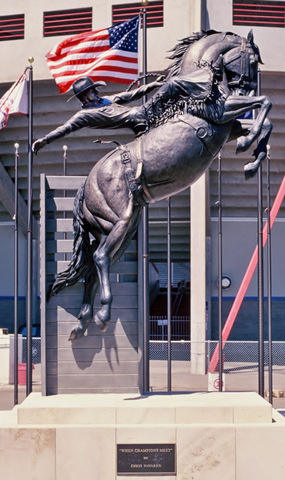 “When Champions Meet” Bronze Sculpture, 10’ x 15’ by artist Chris Navarro. See his portfolio by visiting www.ArtsyShark.com