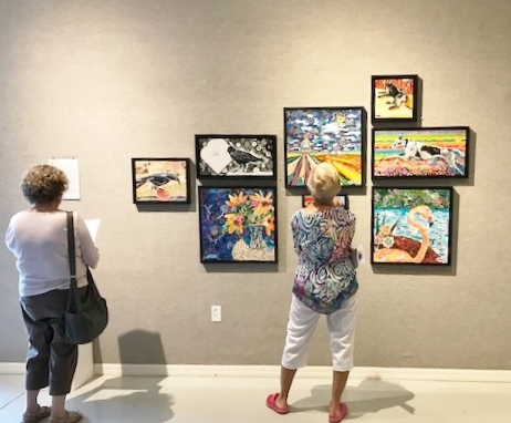 Women at Gallery Exhibition of Raven Skye McDonough's artwork in Englewood, FL
