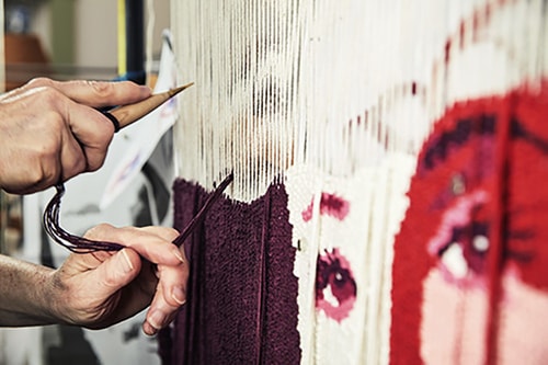 Artist Barbara Burns at work on a tapestry. See her portfolio by visiting www.ArtsyShark.com