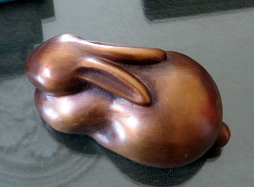 "Sitting Hare" Bronze Sculpture, 6cm x 11cm x 6cm by artist Gilly Thomas. See her portfolio by visiting www.ArtsyShark.com