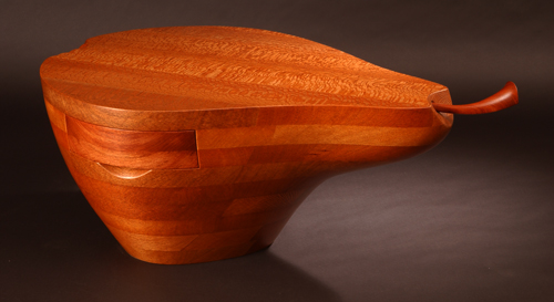 “Lacewood Pear Coffee Table” Lacewood, 16” x 36” x 30” by artist Mark Levin. See his portfolio by visiting www.ArtsyShark.com