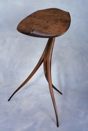 “Nouveau Display/Book Stand: Homage to Wendell Caste” Walnut, 44” x 30” x 30” by artist Mark Levin. See his portfolio by visiting www.ArtsyShark.com