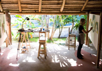 Working at an artist residency in Ondarte Palapa in Akumal, Mexico. Amy Guion Clay is interviewed about the residency process at www.ArtsyShark.com