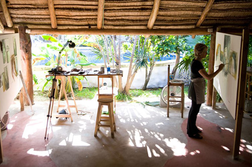Working at an artist residency in Ondarte Palapa in Akumal, Mexico. Amy Guion Clay is interviewed about the residency process at www.ArtsyShark.com