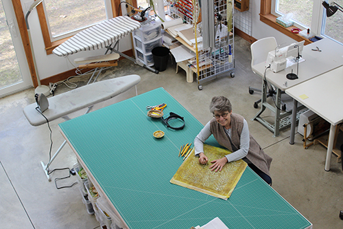 Artist Cheryl Rezendes in her studio. See her portfolio by visiting www.ArtsyShark.com