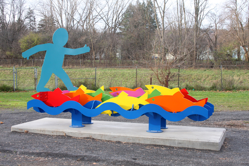 “Honoring the Onondaga Creek” (Meachem Field, Syracuse, NY) Painted Aluminum, 3’10” x 12’ x 6’7” by artist Peter Michel. See his portfolio by visiting www.ArtsyShark.com 