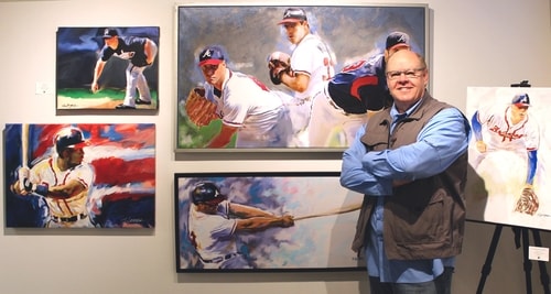 Artist Steven Lester with sports paintings. See his portfolio by visiting www.ArtsyShark.com