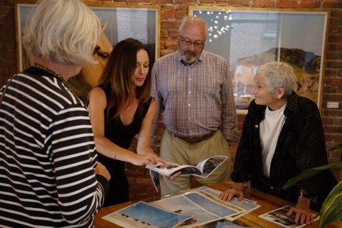 Jennifer Irving meets with visitors to the pop-up gallery.