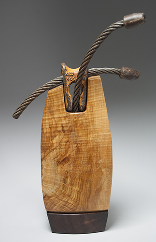"Release" Logging Choker Cable, Maple and Walnut Wood Sculpture, 12" x 20" x 2.5" by artist Joseph Boddy. See his portfolio by visiting www.ArtsyShark.com