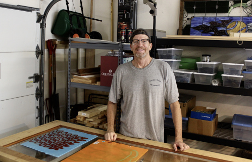 Artist Mark McCall in his studio. See his portfolio by visiting www.ArtsyShark.com