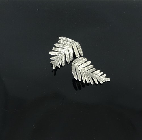 “Sterling Silver Resurrection Fern Earrings” Lost Wax Cast Sterling Silver Post Earrings, 1.5” Long by artist JoAnn Graham. See her portfolio by visiting www.ArtsyShark.com