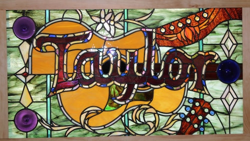 "Taylor" Stained Glass, Lead Came and Copper Foil, 44” x 26” by artist Mark McCall. See his portfolio by visiting www.ArtsyShark.com