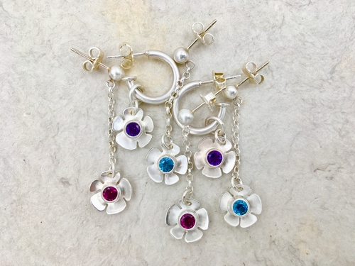 Mini Silver Flower Earrings: Sterling Silver with Blue Zircon, Amethyst and Rhodolite Garnet by artist Gail Golden. See her portfolio by visiting www.ArtsyShark.com