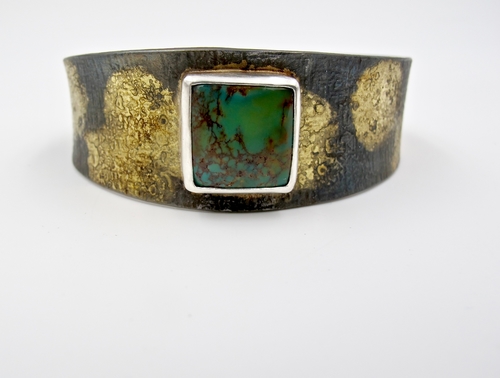 Steel and Turquoise Cuff: 1080 Mild Steel (Iron), 20k Fused Gold, 14x14mm Nevada Royston Turquoise Cabochon Set in Fine Silver by artist Gail Golden. See her portfolio by visiting www.ArtsyShark.com
