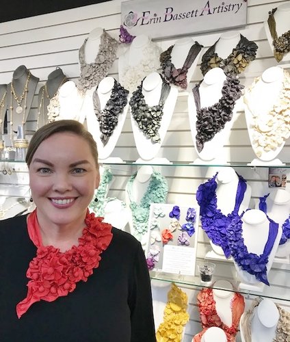 Erin Bassett presents her handmade accessories at a trade show in Atlanta.