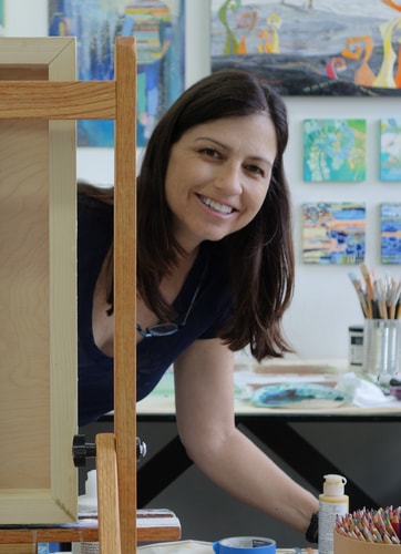 Artist Kathy Ferguson in her studio. See her portfolio by visiting www.ArtsyShark.com