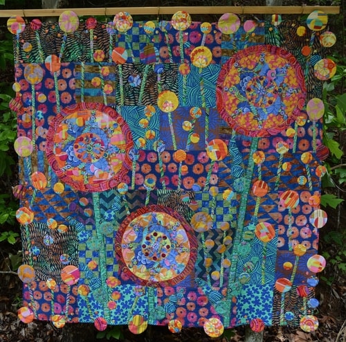 “Dance with Joy” Cotton and Embroidery Floss, 60” x 60” by artist Silke Cliatt. See her portfolio by visiting www.ArtsyShark.com