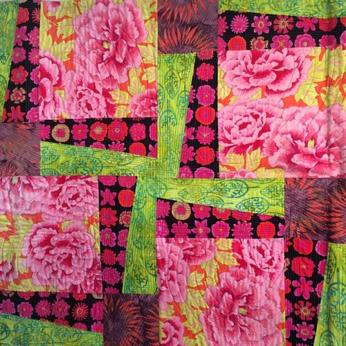 “How Does Your Garden Grow?” Cotton, 34” x 34” by artist Silke Cliatt. See her portfolio by visiting www.ArtsyShark.com