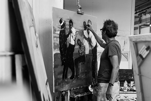 Artist John W. Carlson in his studio. See his portfolio by visiting www.ArtsyShark.com