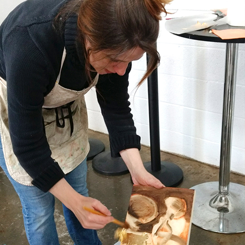 Artist Andie Freeman at work in her studio