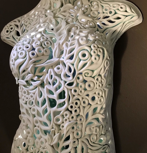 Illuminated hand built porcelain female torso wall hanging by Vivian Saich