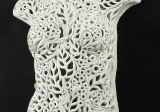 Hand built and carved porcelain female torso by Vivian Saich