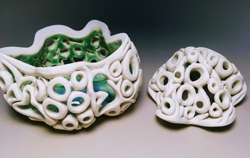 Hand built and pierced porcelain box with lid by Vivian Saich