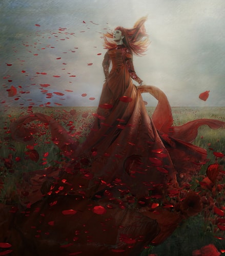 "Opium" Digital Photograph of a woman in a long flowing dress in a field of air borne poppy blossoms by Jan Gierat