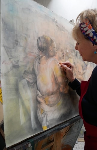 Artist Maggie Wright at work on a drawing