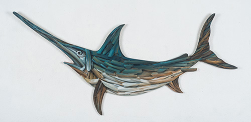 Leaping Marlin art assemblage by Johnny Karwan is handpainted wood of a fish with tree branch patterns