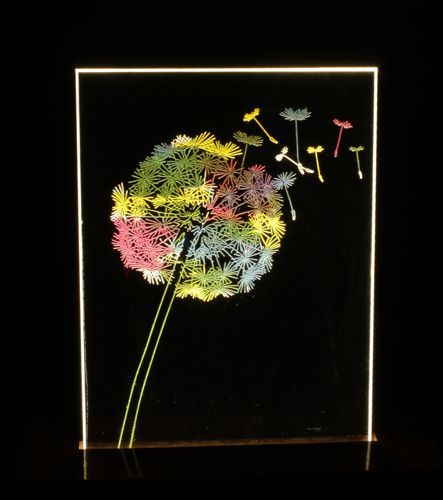LED lamp of a dandelion puff etched on lucite by Jean-Luc Godard