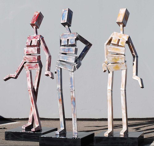 Abstract figurative aluminum sculpture of three female figures by James Moore