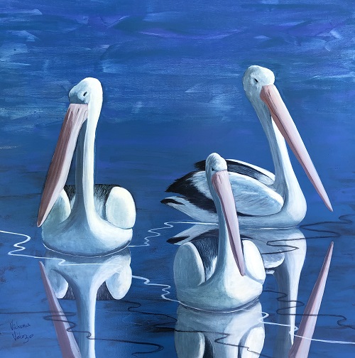 Painting of three pelicans in the water by Victoria Velozo