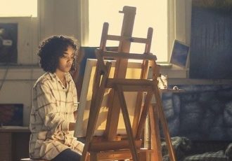 Artist working in her studio