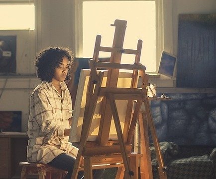 Artist working in her studio